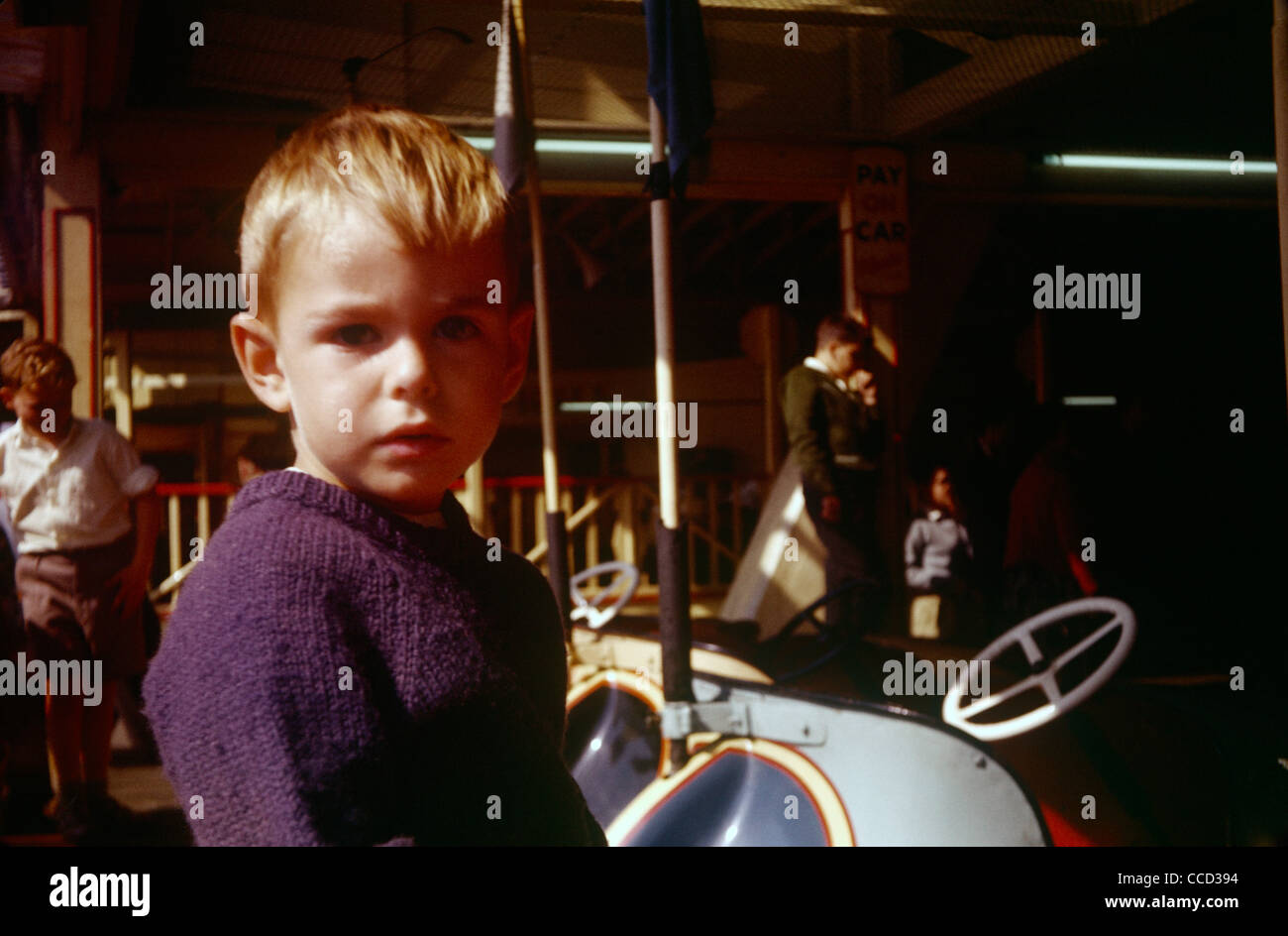 A young boy has his photo taken at the fairground on Southend seafront in the early nineteen sixties. Stock Photo