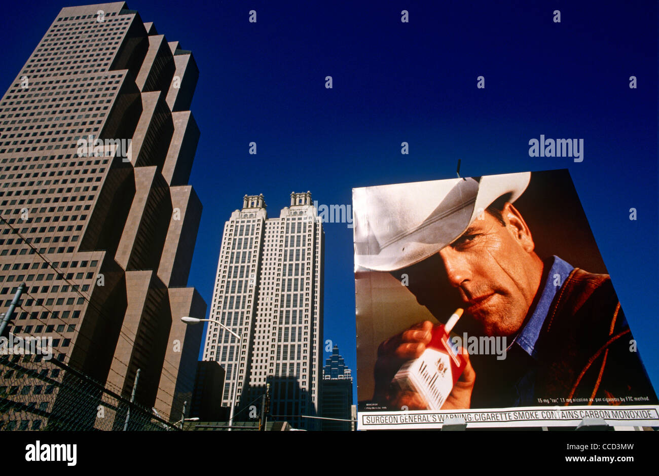A Phillip Morris ad using the famous Marlboro Man cowboy character on a downtown Atlanta billboard. Stock Photo