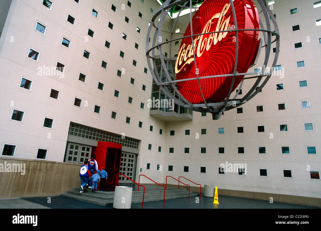 Visitors enter the Coca-Cola corporate museum in the company's Atlanta headquarters. Stock Photo
