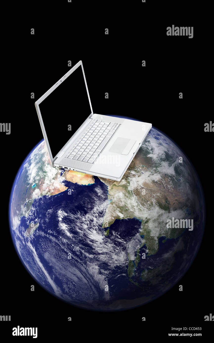 A laptop on top of the world Stock Photo