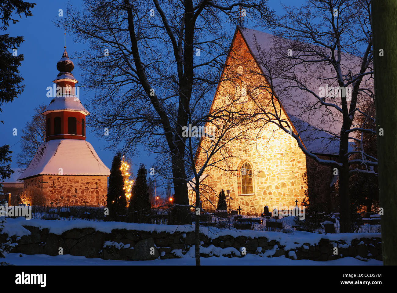 Christmas night scenery in Finland, church in snow, xmas tree Stock Photo