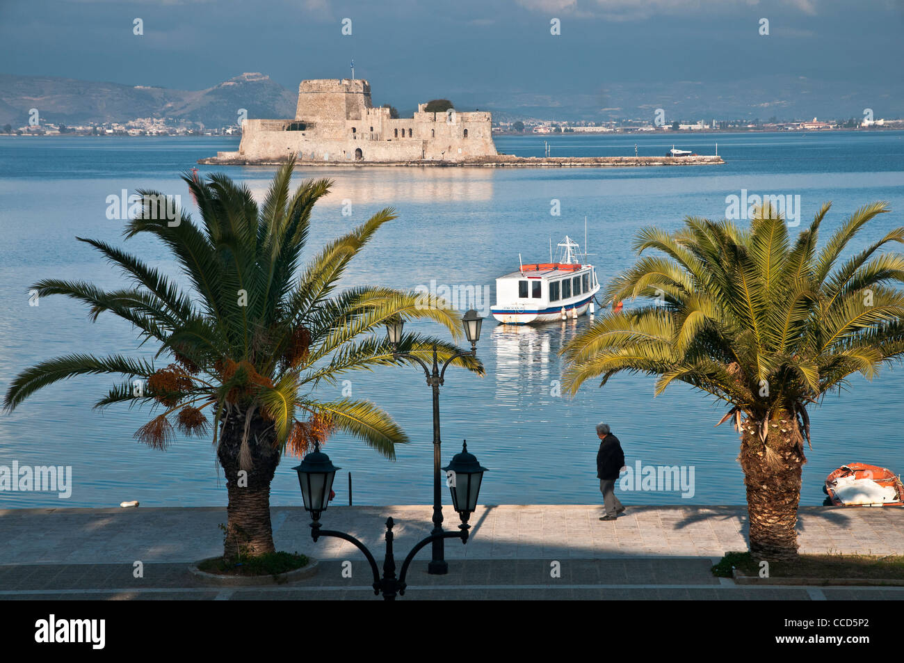 The harbour at Nafplio with the Bourtzi island and fort in the background, Argolid, Peloponnese, Greece. Stock Photo
