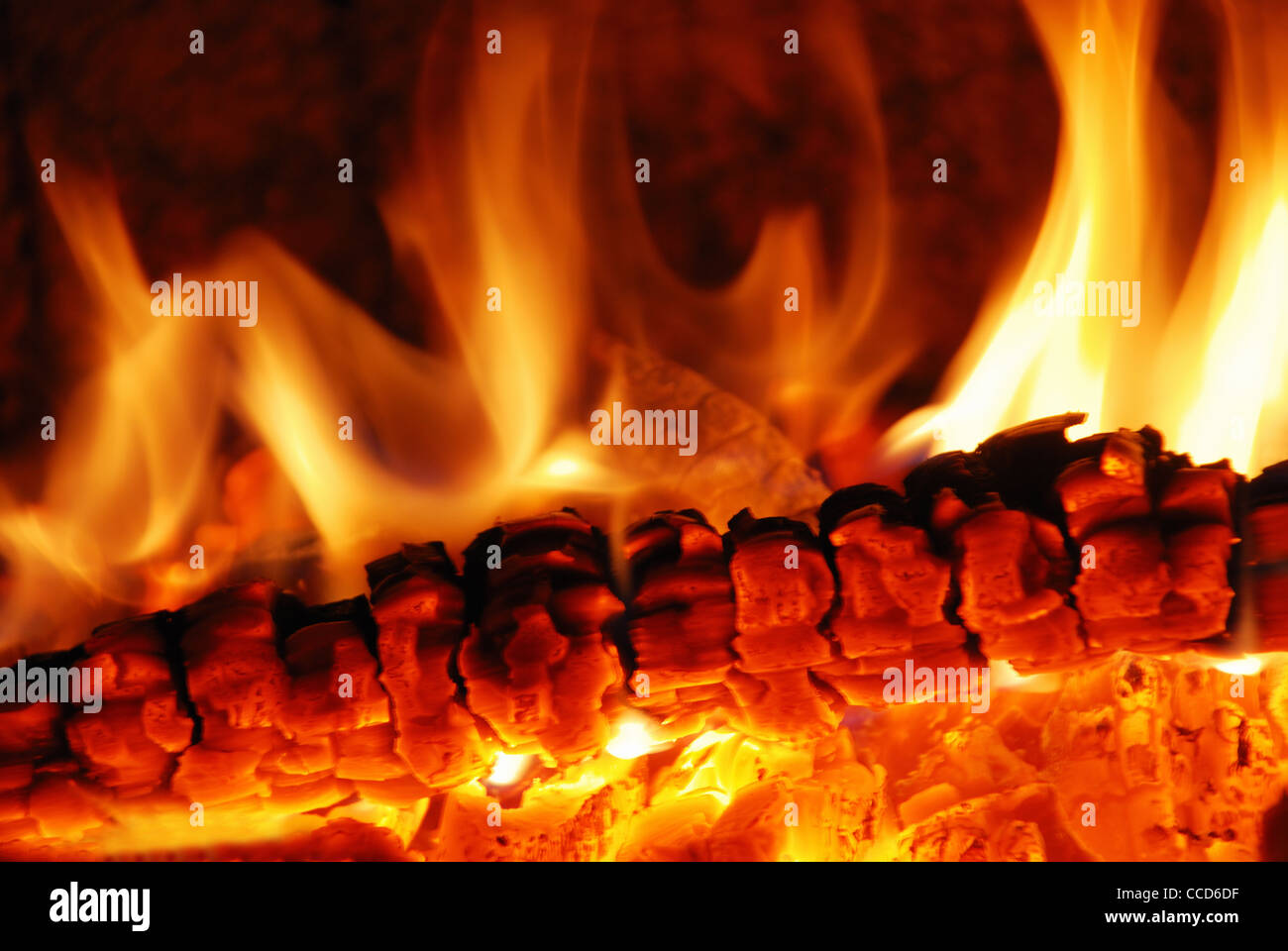 live coals in the oven against black background Stock Photo