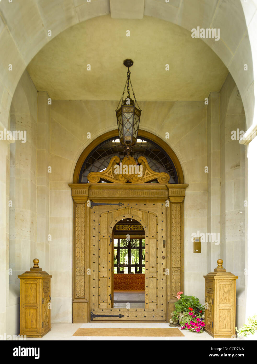 Halcyon Hall, Private House, McGuire Architecture and Design, Radlett, Herts, UK, 2009, Front entrance with partial open door Stock Photo