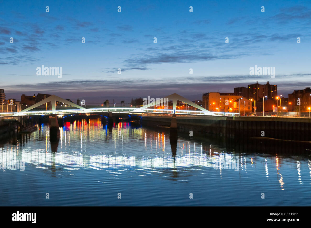 Broomielaw  / Tradeston footbridge over River Clyde at night time Glasgow Scotland Stock Photo