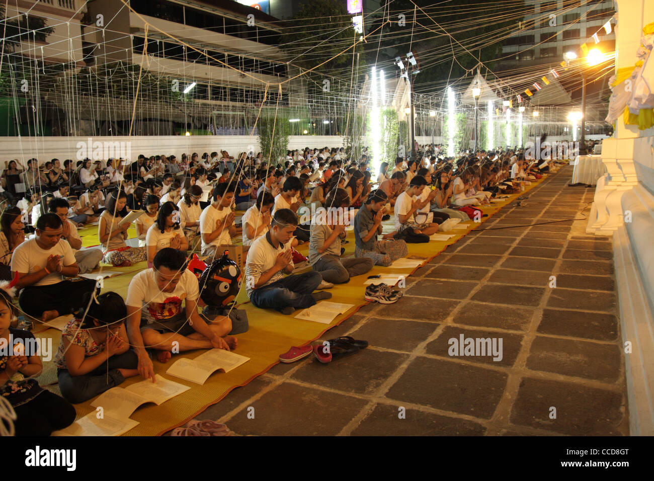 Thai people chant for good luck in new year 2012 , Pathum Wanaram