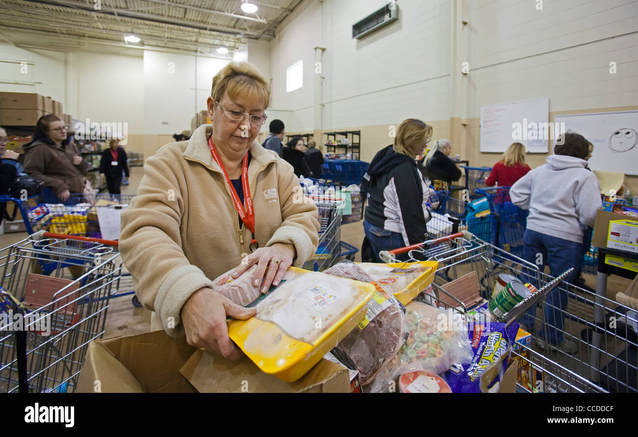 Volunteers Work at Food Pantry Stock Photo