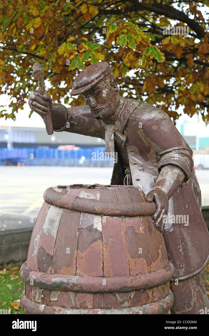 A statue of a cooper or barrel maker at the National Brewery Centre