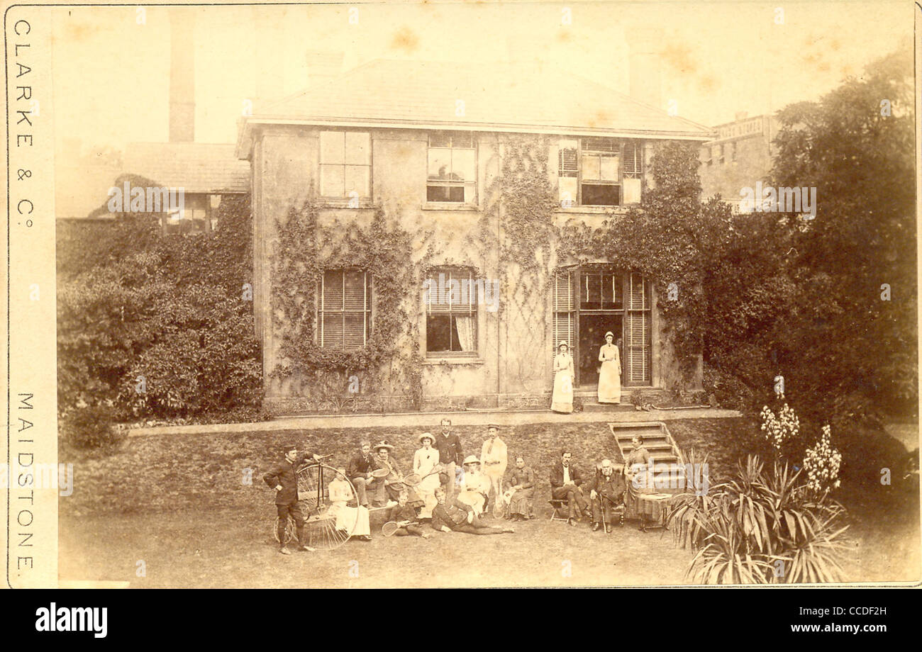 Cabinet photograph of family gathering in their garden Stock Photo