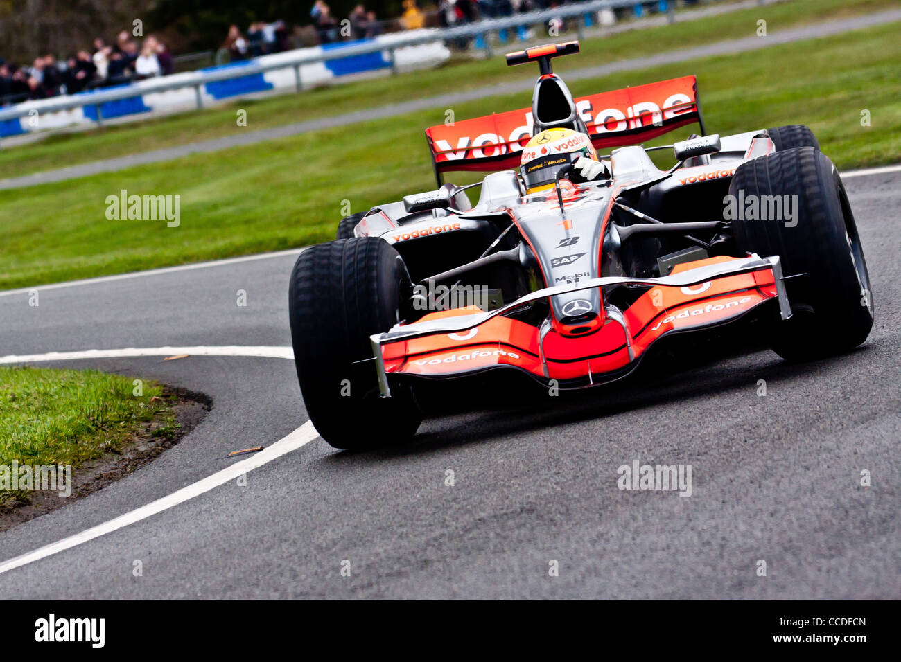 Lewis Hamilton driving around at Powered by Mercedes Benz at Mercedes
