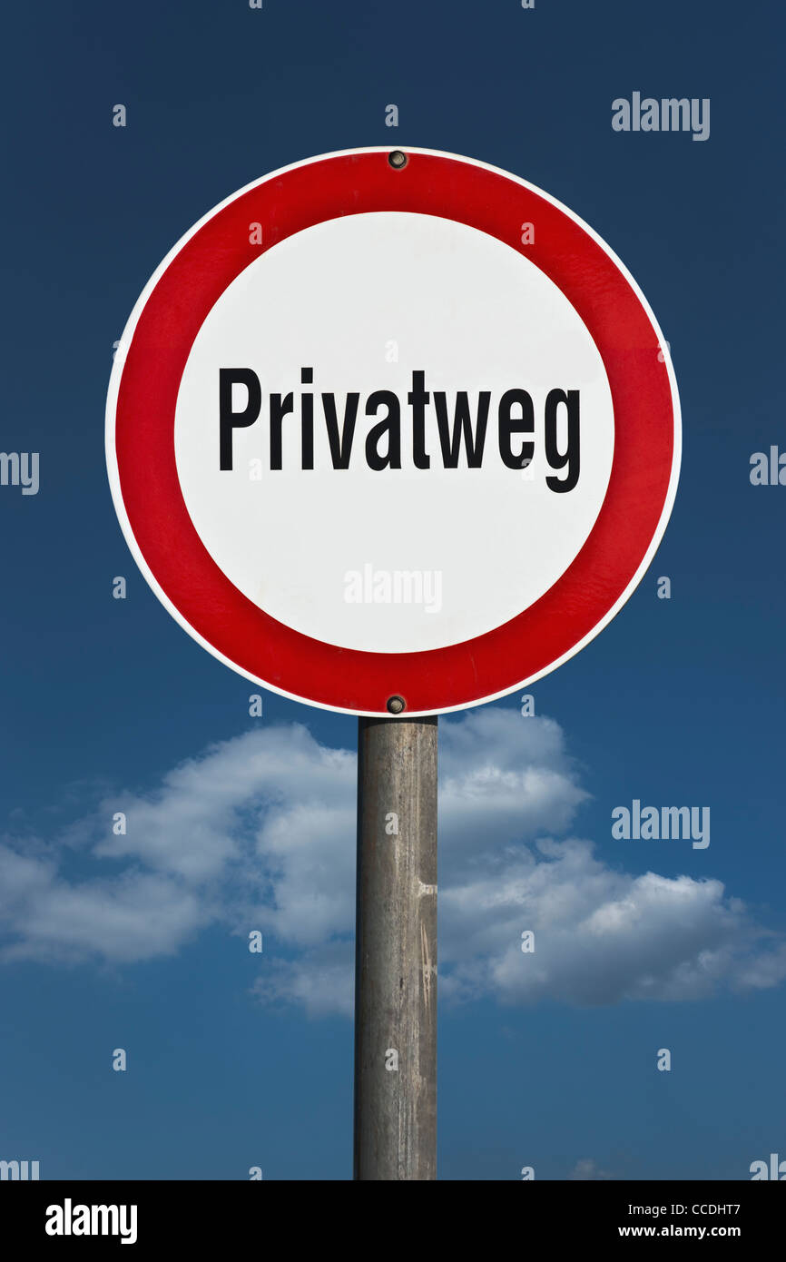 Detail photo of a road sign with the inscription private road in German Stock Photo