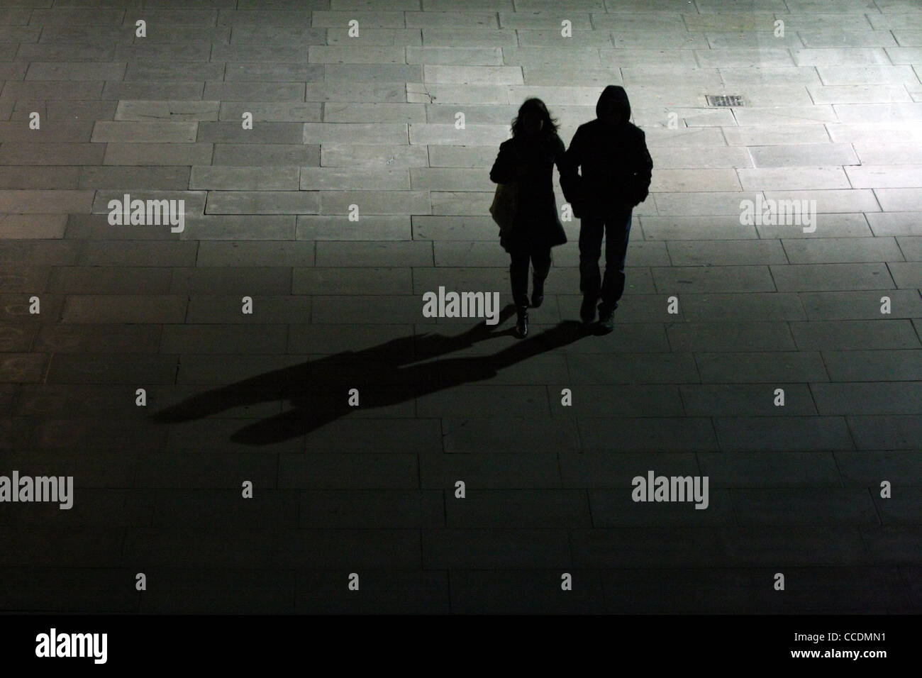 Silhouettes Of Two People Walking Arm In Arm Along The Embankment Of The River Thames At Night Scene Lit By A Street Lamp Stock Photo Alamy Silhouettes Of Two People Walking Arm In Arm Along The Embankment Of The River Thames At Night Scene Lit By A Street Lamp Stock Photo Alamy