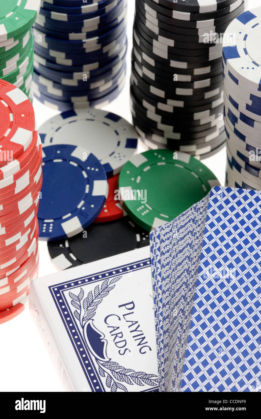 Poker game, different gaming tokes, chips, of different values. Playing cards. Stock Photo