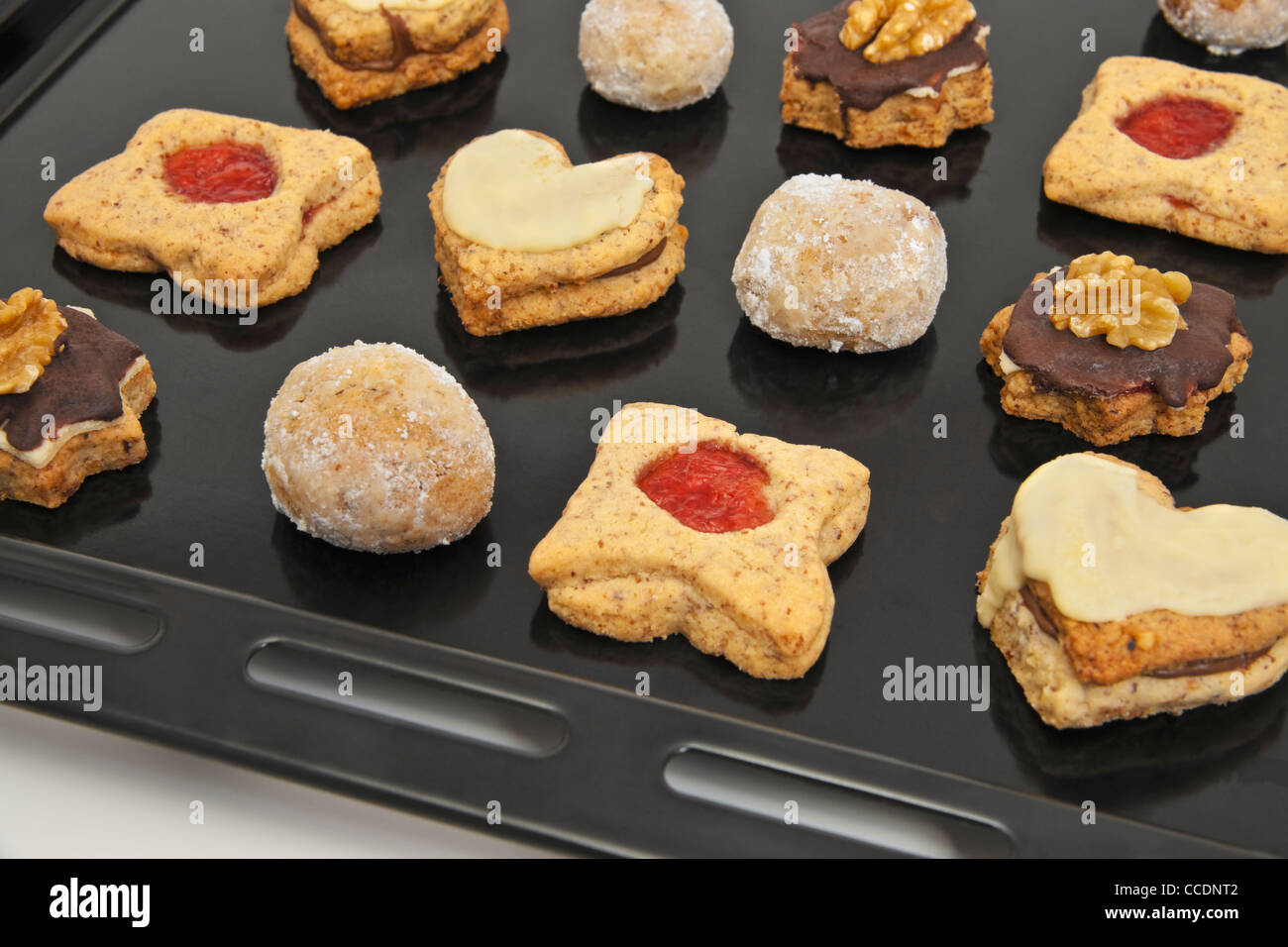 Detail photo of a baking tray with home-made Christmas biscuits Stock Photo
