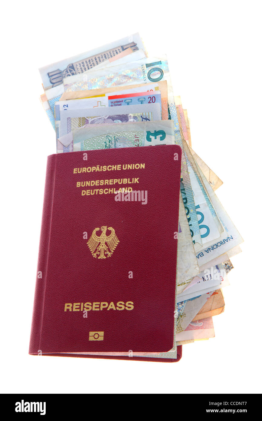Travel documents, passport and different currencies, bank notes, cash. Stock Photo