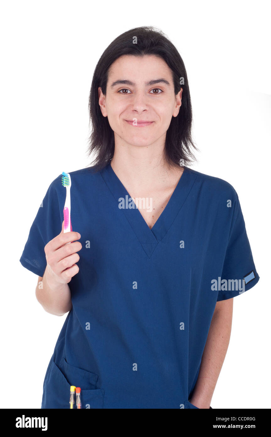 Dentist holding toothbrush Stock Photo
