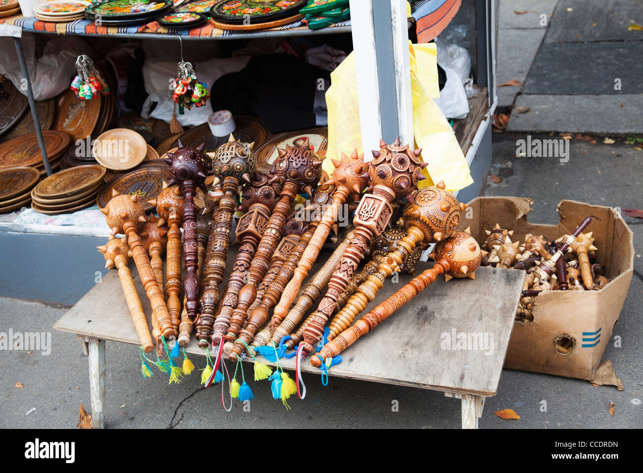 Wooden battle maces for sale in a souvenir shop near St Andrew's Church, Andriyivsky usviz, Podil, Kiev, Ukraine, eastern Europe Stock Photo