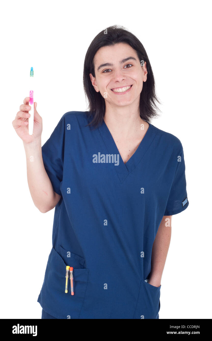 Dentist holding toothbrush Stock Photo