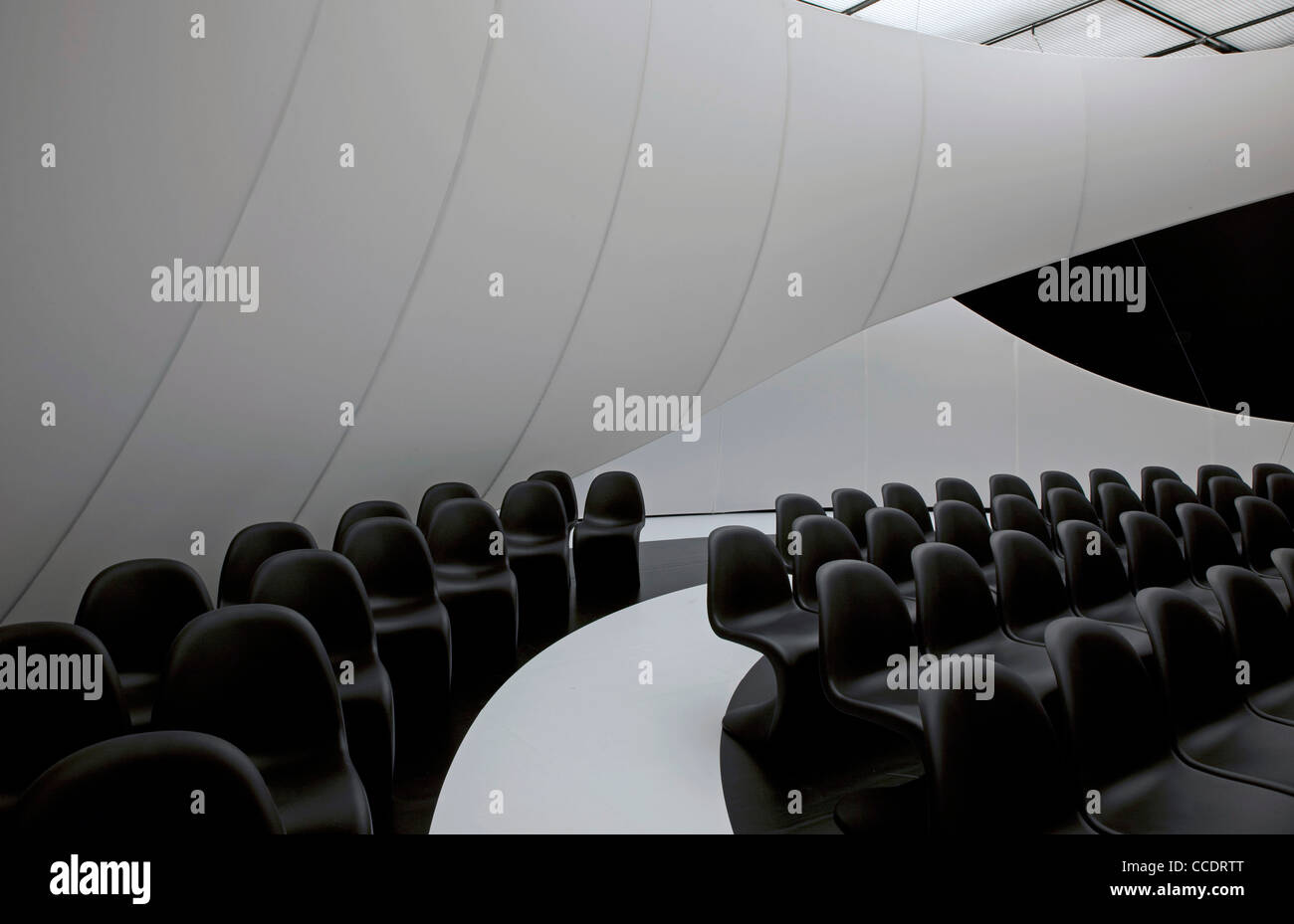 Chamber music hall by Zaha Hadid, Vitra chairs filled the hall Stock ...