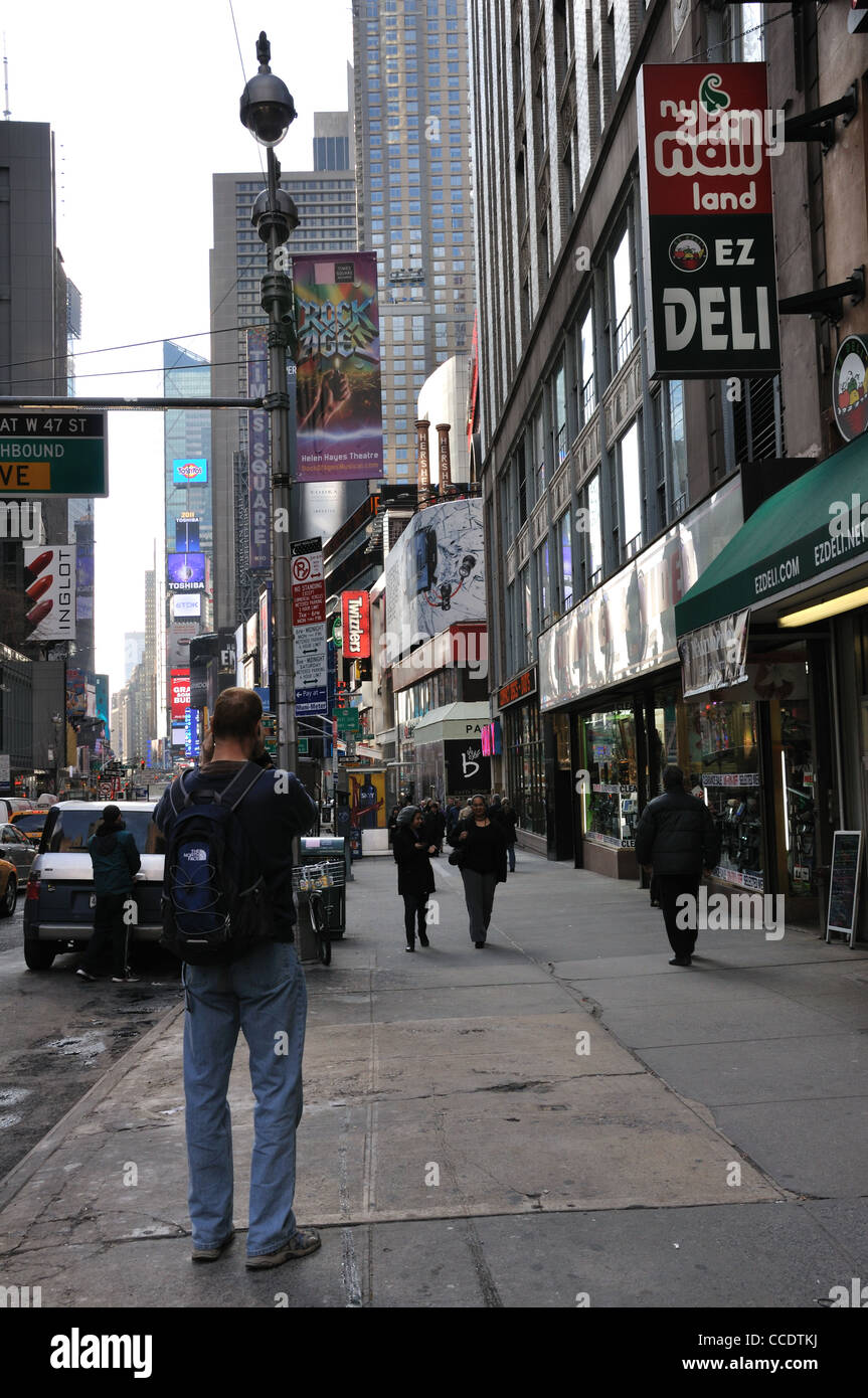 Tourist taking photos, New York street Stock Photo