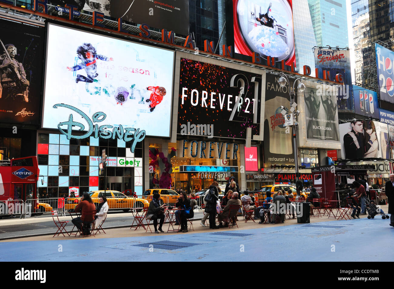 New York times Square broadway view of street showing adverts disney forever  21 twenty one Stock Photo - Alamy