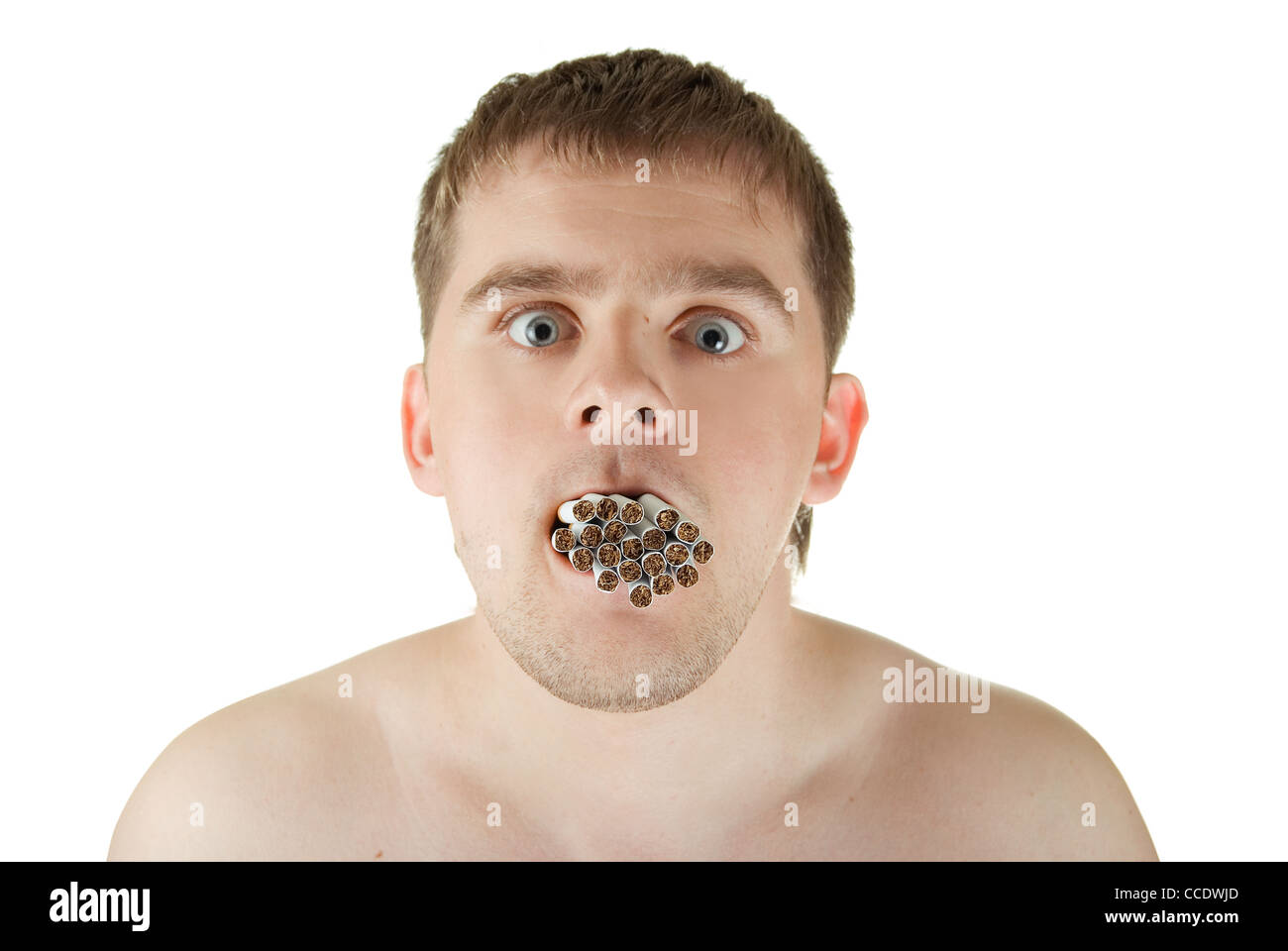 young man with many cigarettes in his mouth Stock Photo