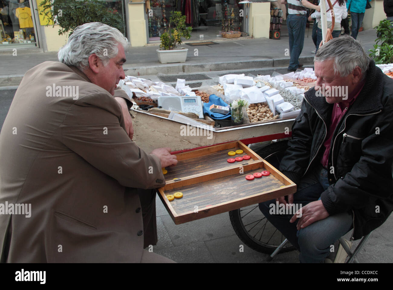 Men playing tavli (backgammon), traditional game in Greece, Monastiraki, Athens, Attica, Greece Stock Photo