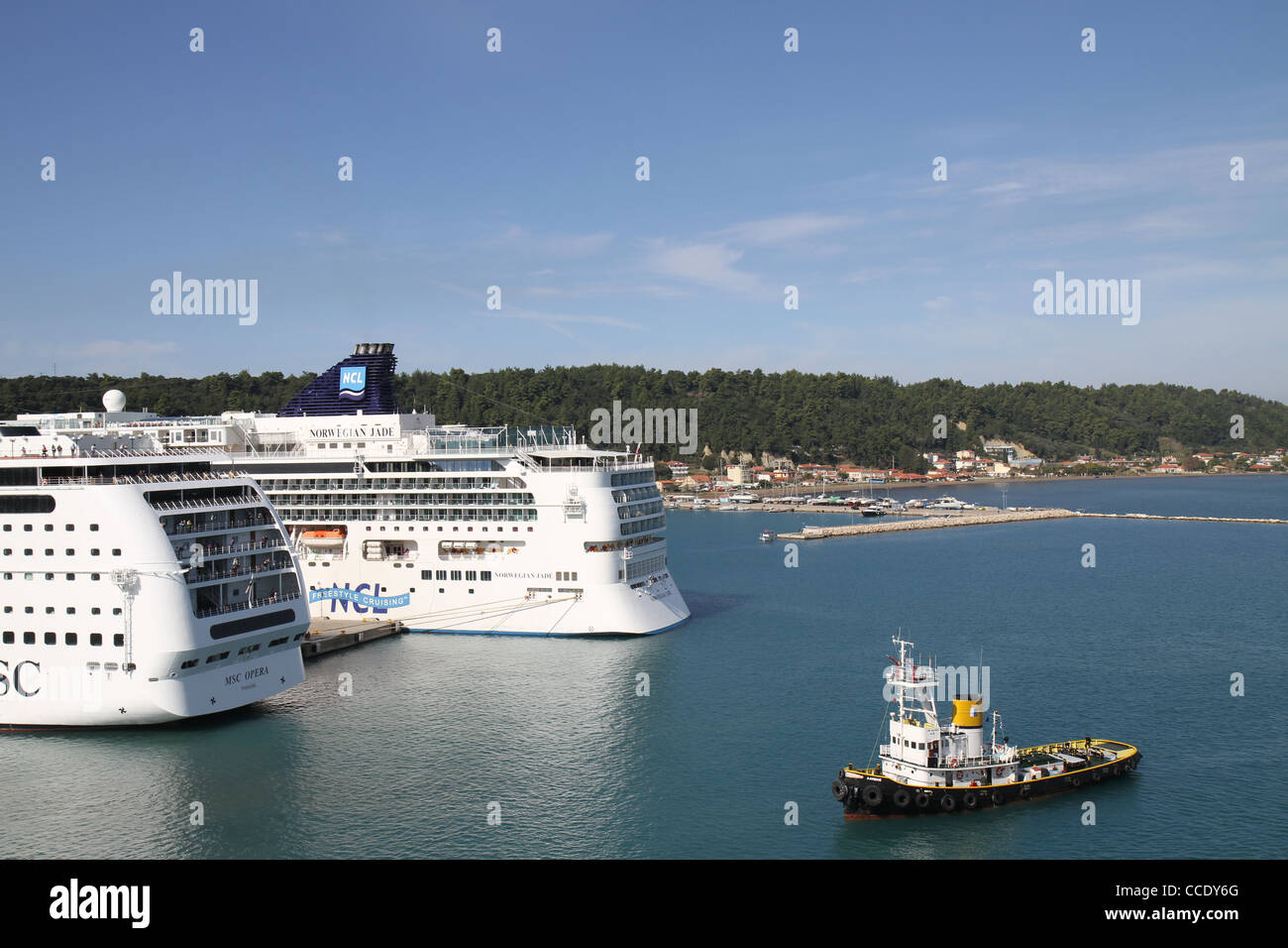 Two cruiseships and the pilot in the port of Katakolon, Olympia, Greece Stock Photo