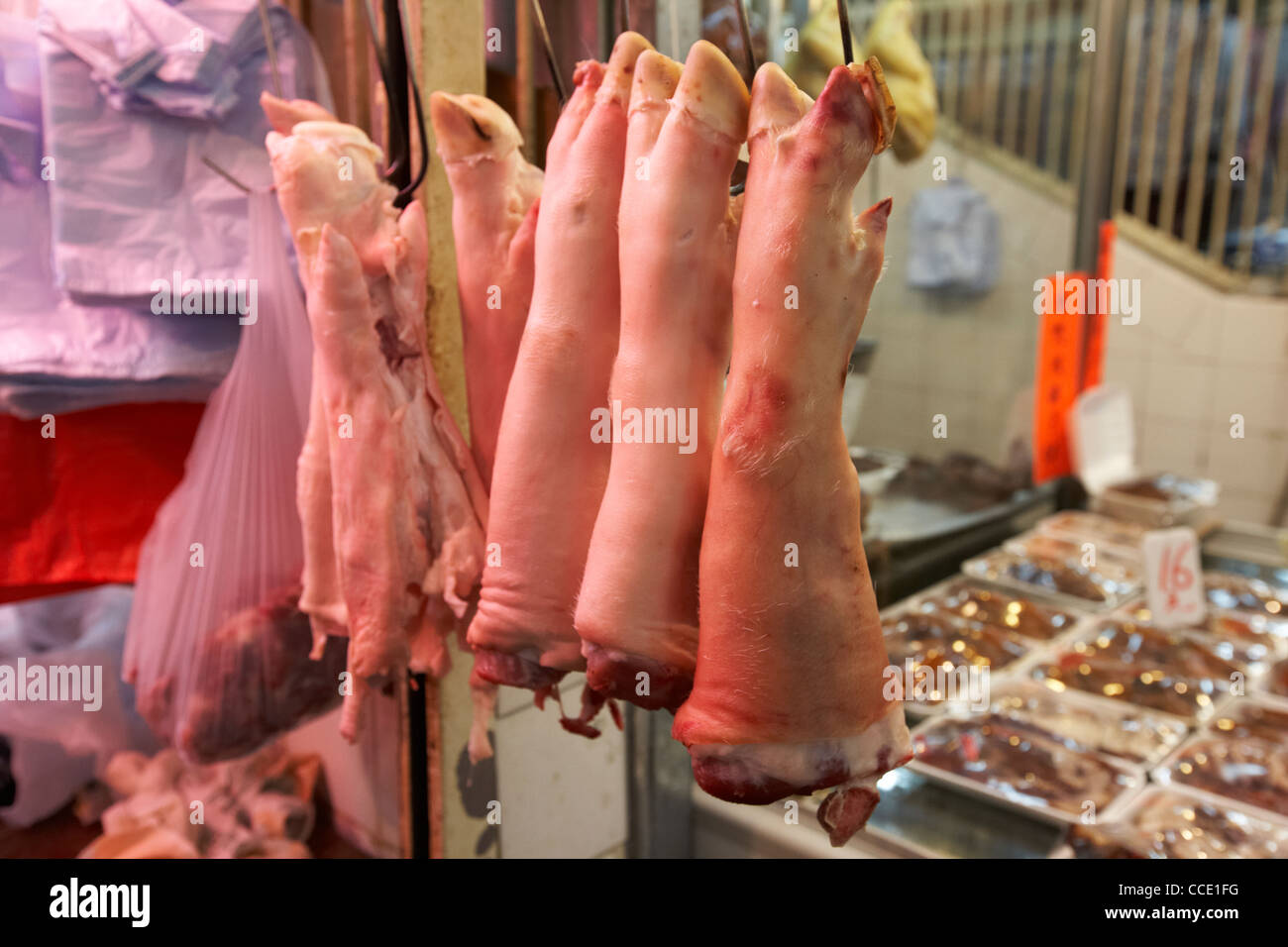 pigs trotters on pork butchers stall at aberdeen municipal indoor market hong kong hksar china asia Stock Photo