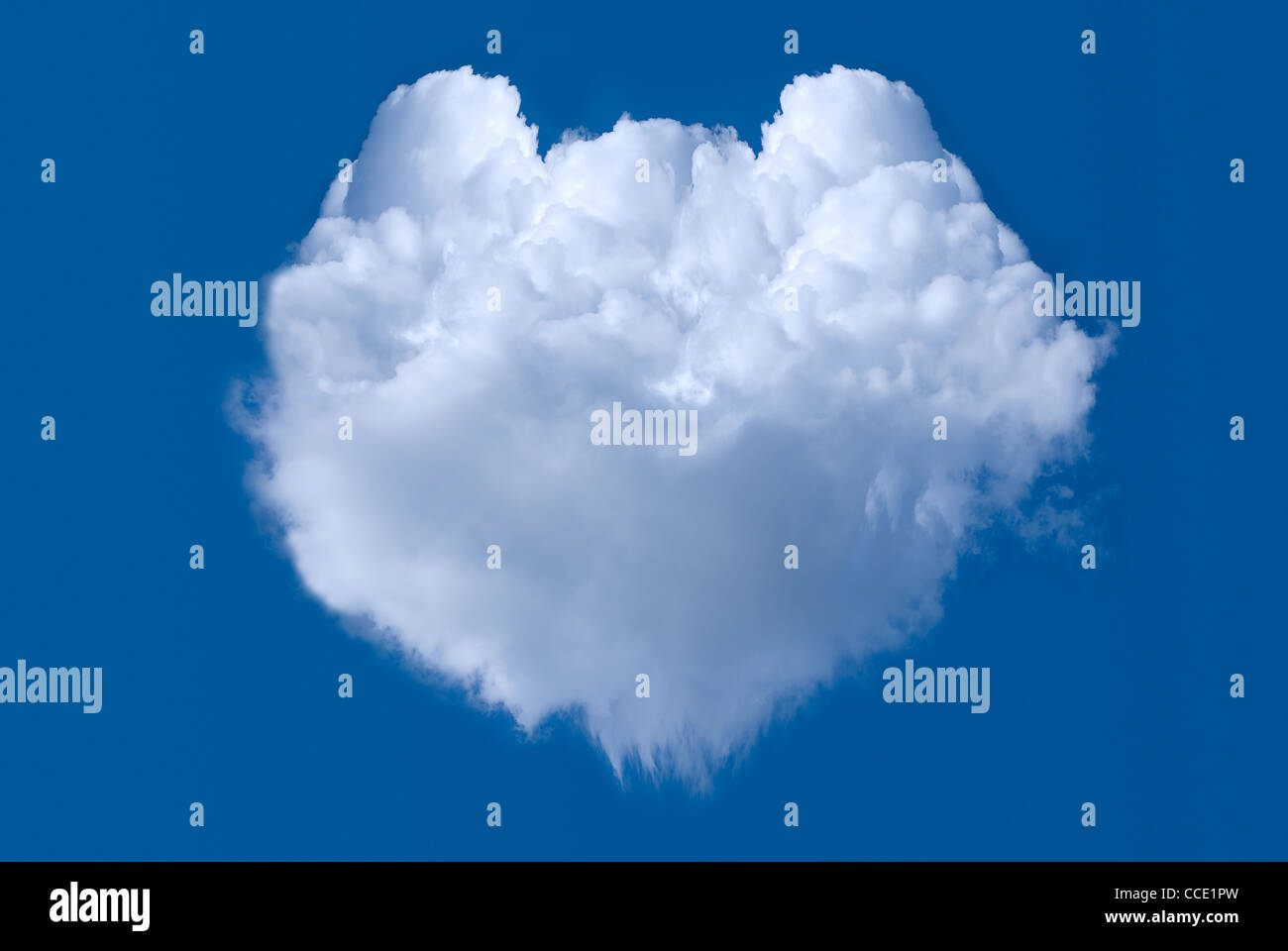 Cloud shaped heart on blue sky background Stock Photo - Alamy
