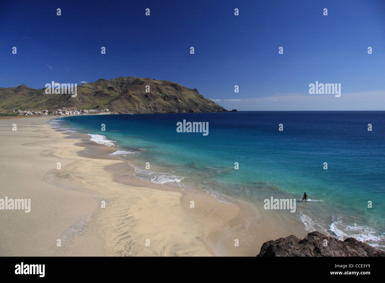 Lone swimmer on San Pedro beach, Sao Vicente Island, Cape Verde Archipelago Stock Photo