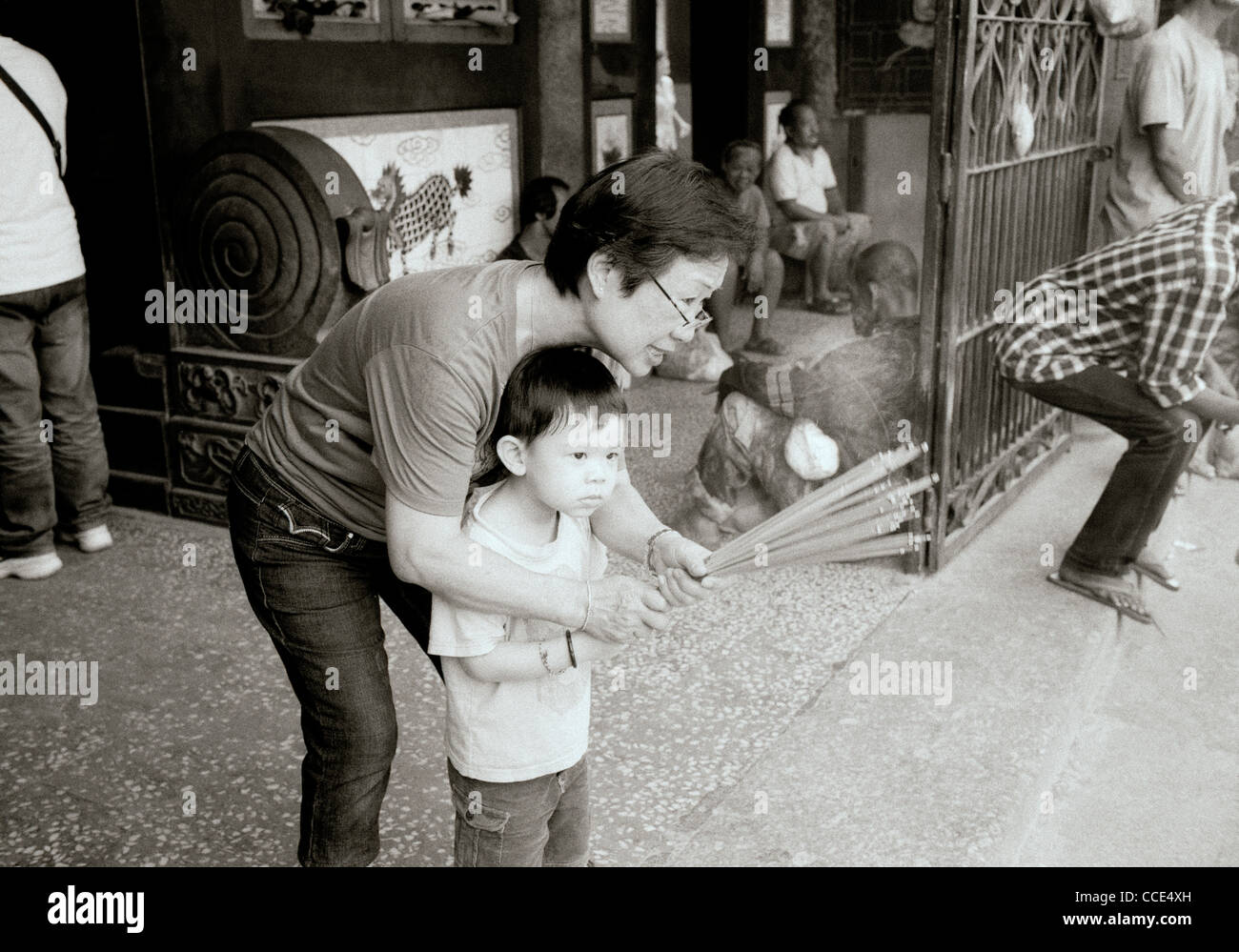 Worship at the Kuan Yin Teng Temple, Temple of the Goddess of Mercy in