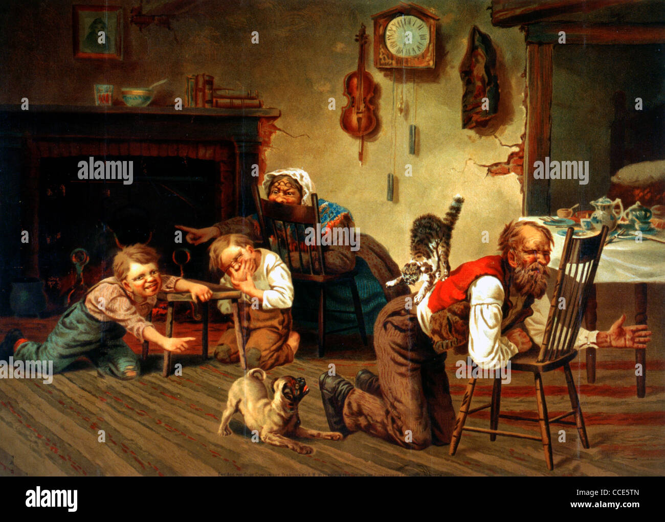 Two children enjoying the commotion caused at meal time when a dog has ...