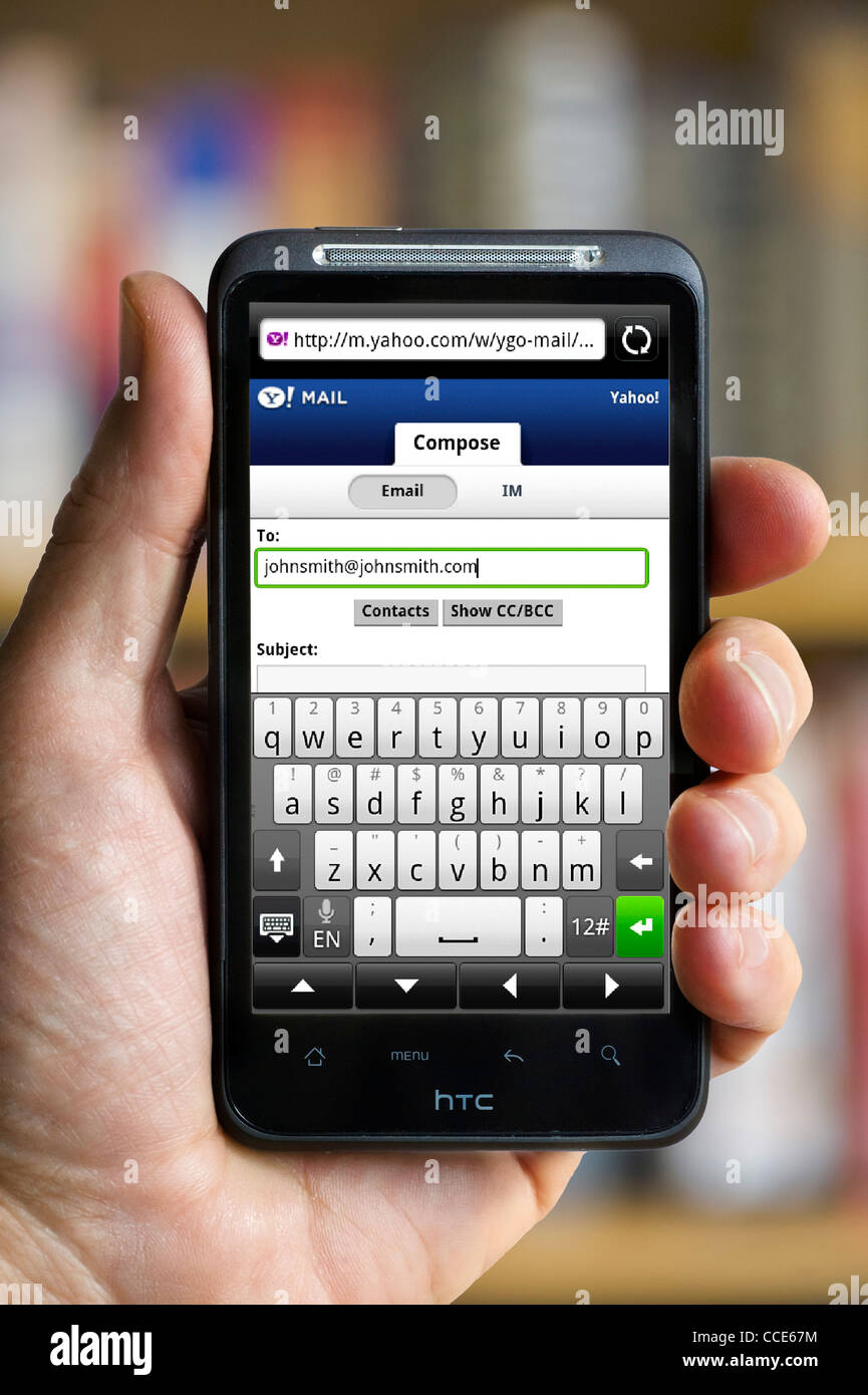 Composing an email using Yahoo Mail on an HTC smartphone Stock Photo ...