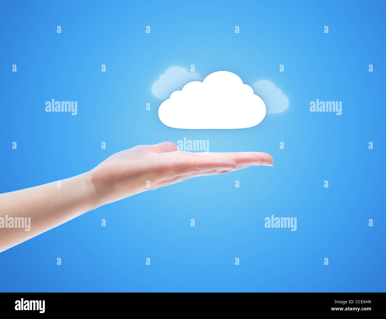 Woman hand share the cloud against blue background. Concept image on cloud computing theme with copy space. Stock Photo