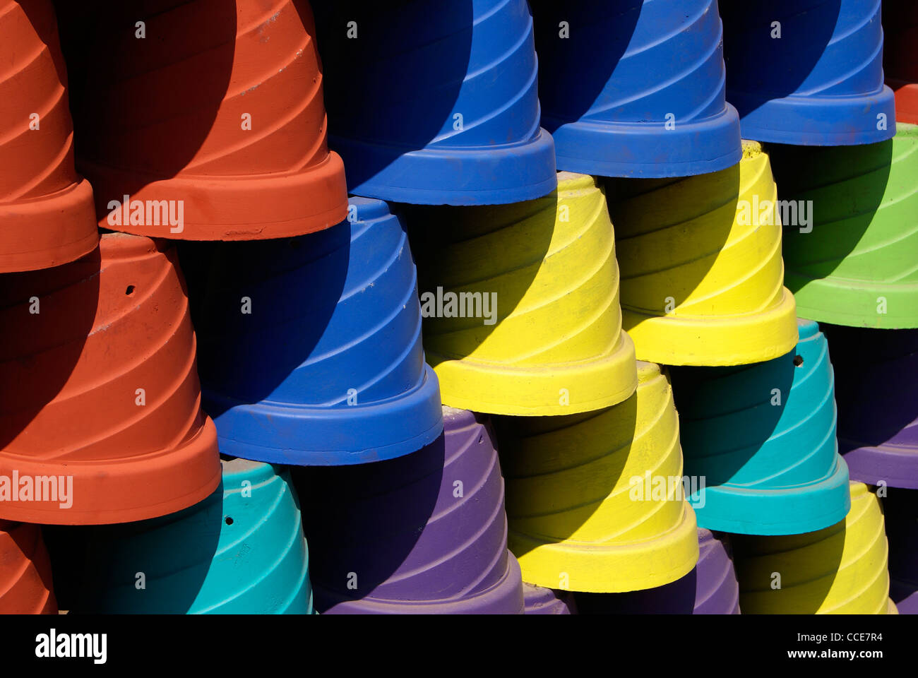 Different color flower pots arranged in a order Stock Photo Alamy