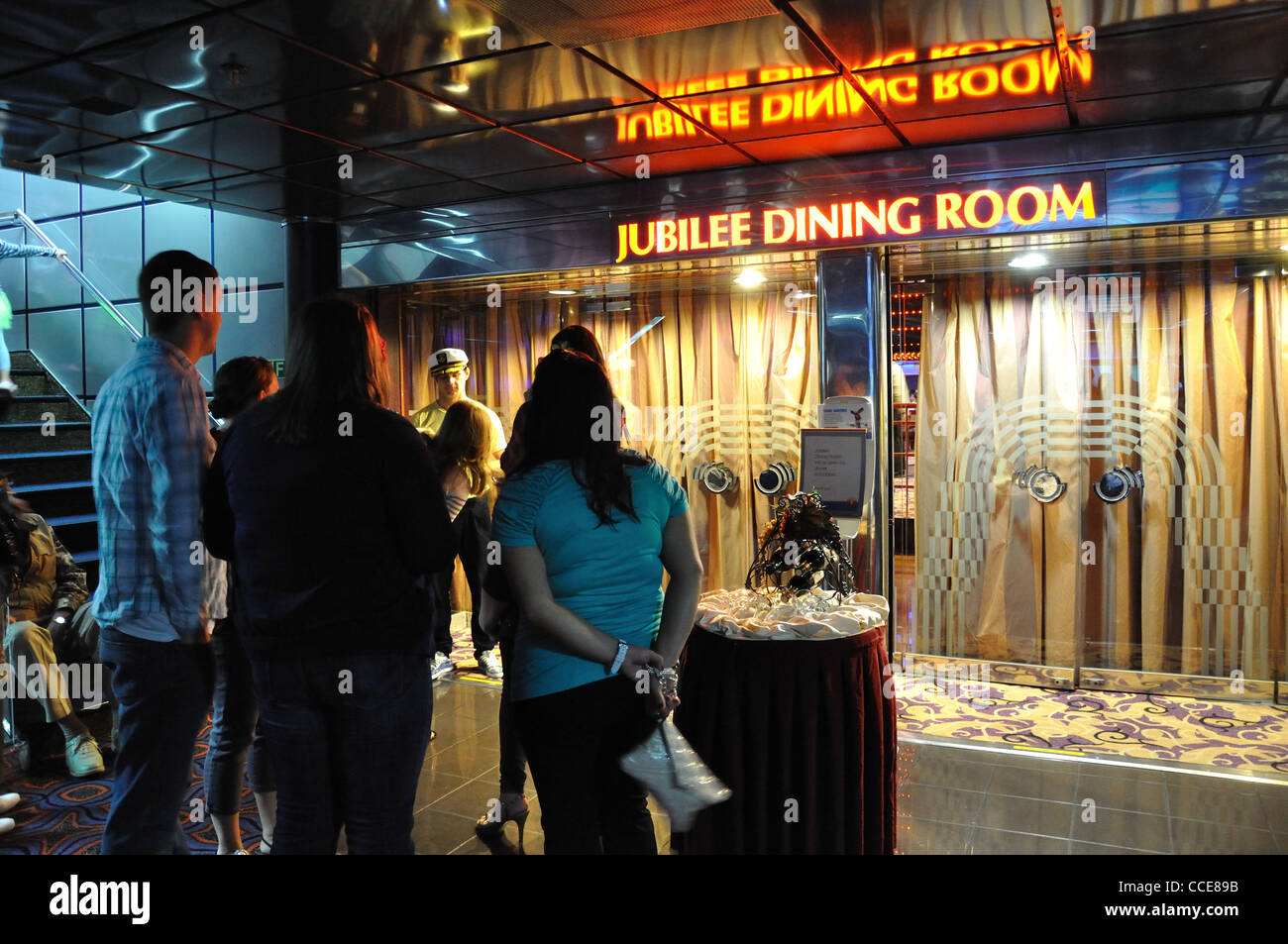 People waiting for dining room to be open for dinner - cruise ship Stock Photo