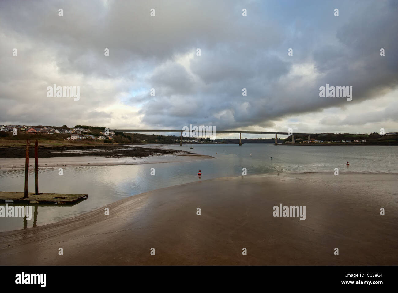 A toll bridge over the river Cleddau in Pembrokeshire Wales Stock Photo