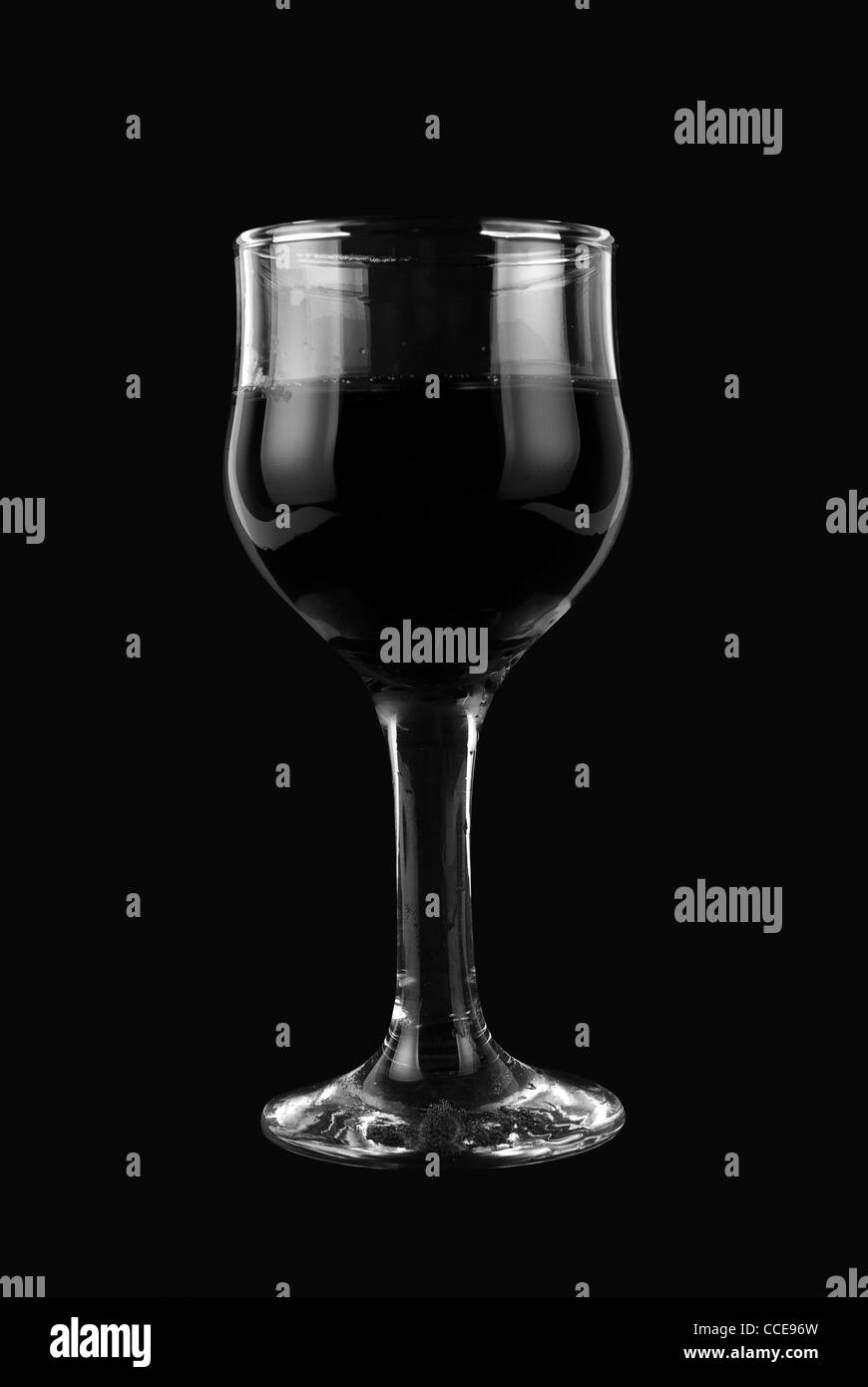 Pouring red wine glass from Black and White Stock Photos & Images - Alamy