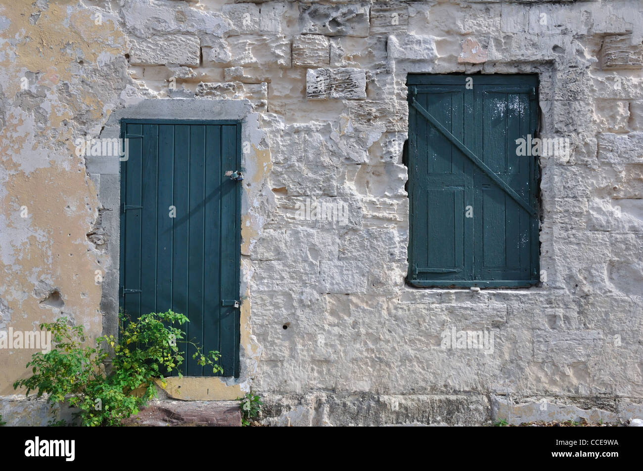 Old House With Green Door And Shutters Nassau Bahamas Stock