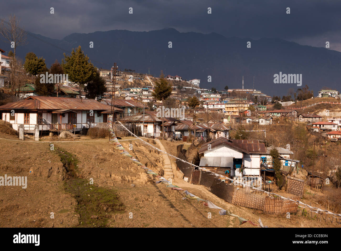 India, Arunachal Pradesh, Tawang, town centre skyline, houses built on steep slopes Stock Photo