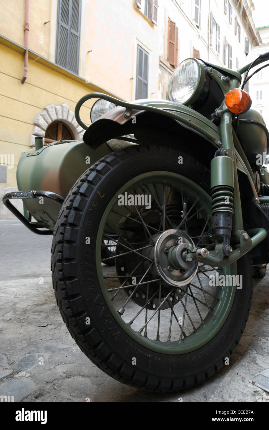 Camouflaged Ural sidecar parked in a street of Rome, Italy Stock Photo