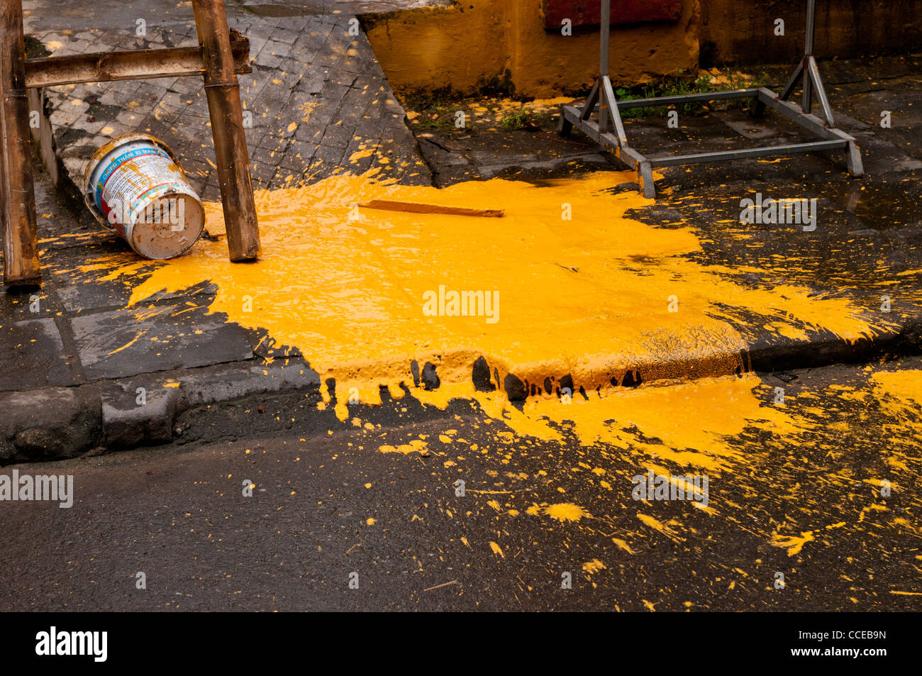 Yellow ochre paint spill, Hoi An, Vietnam Stock Photo