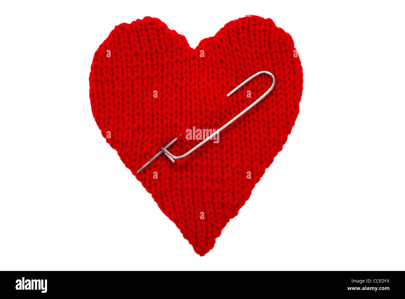 woollen heart made on wires isolated on white background Stock Photo