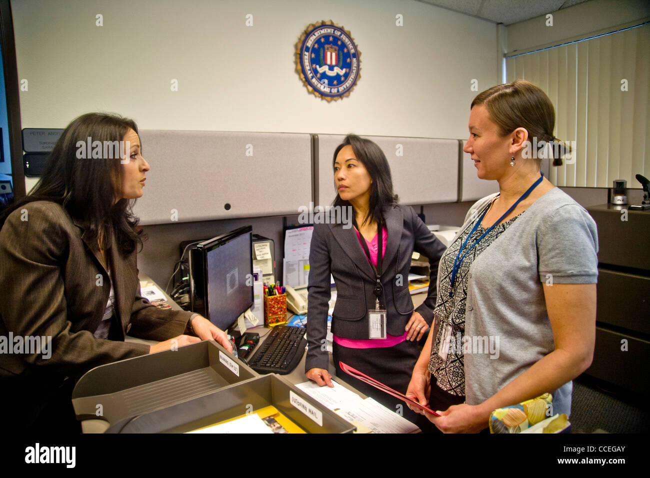 Three Female Fbi Agents Discuss A Case In Santa Ana Ca Office Note Filipino American In