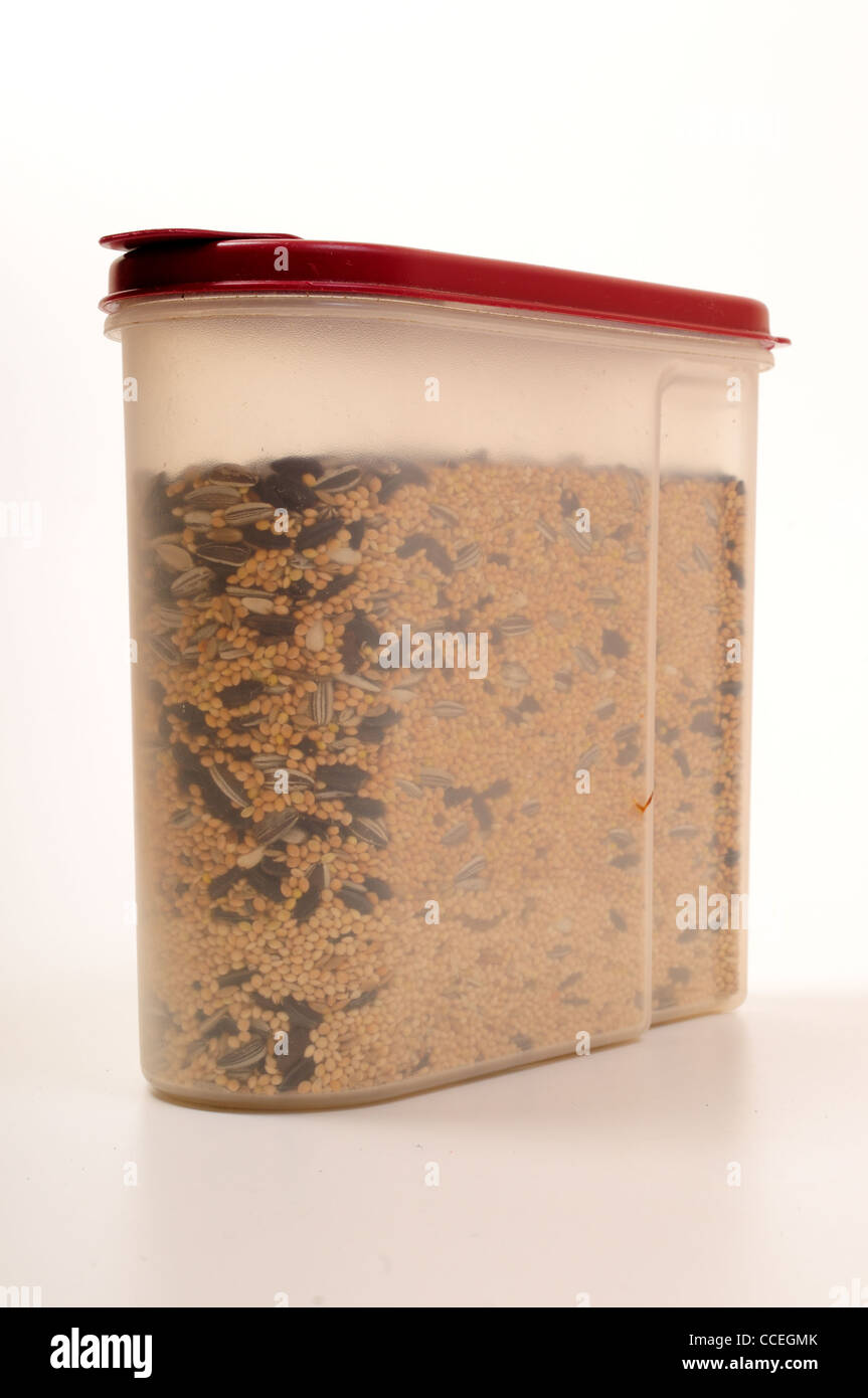 Bird Seed In A Plastic Container Stock Photo Alamy