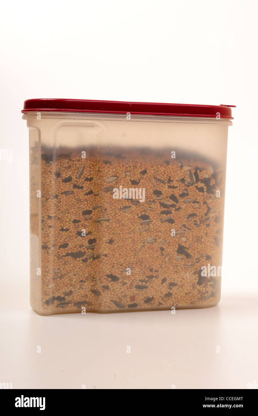 Bird Seed In A Plastic Container Stock Photo Alamy