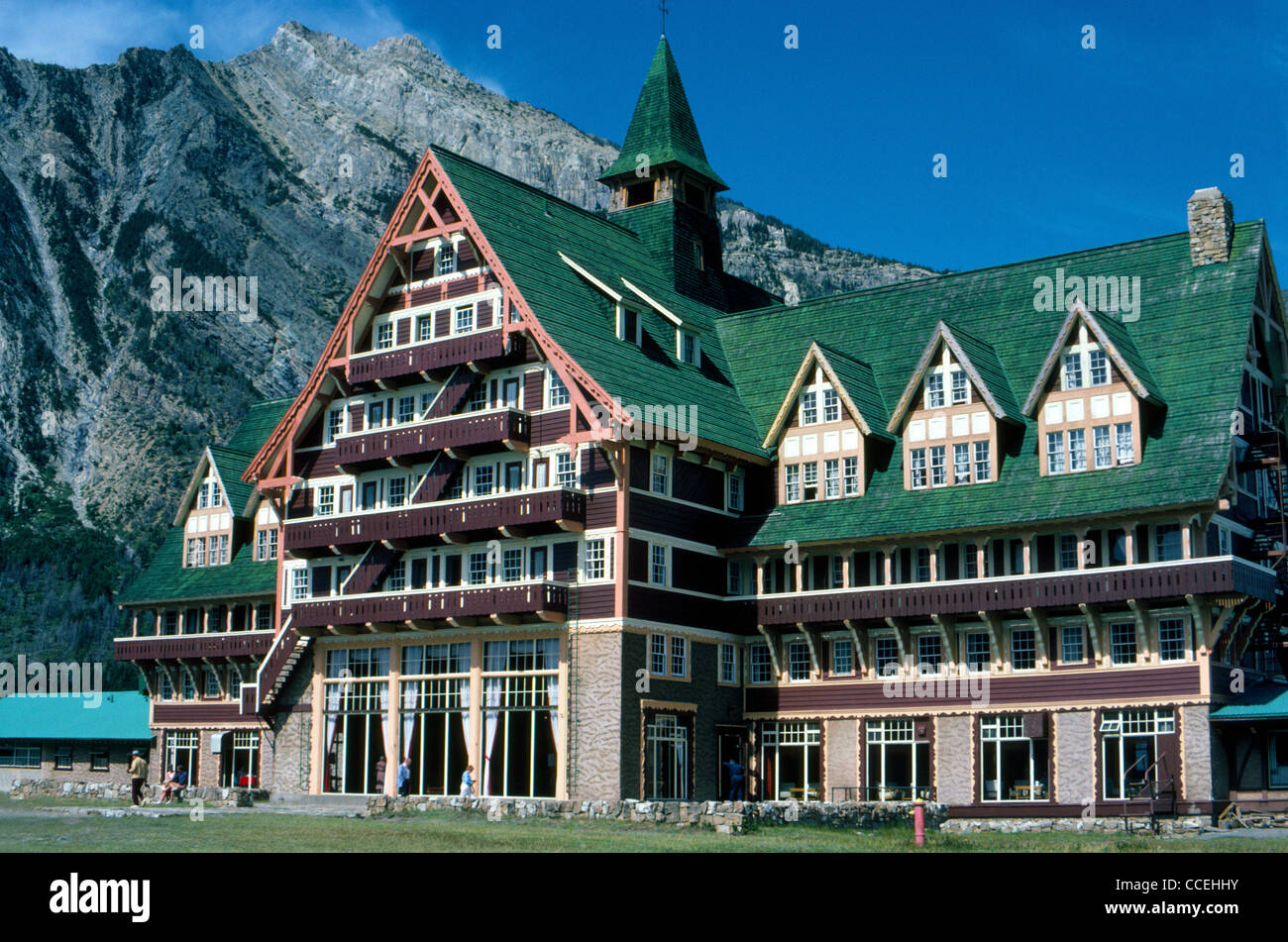 The classic 1920s Prince of Wales Hotel is the premier lodging for visitors at Waterton Lakes National Park in Alberta, Canada. Stock Photo