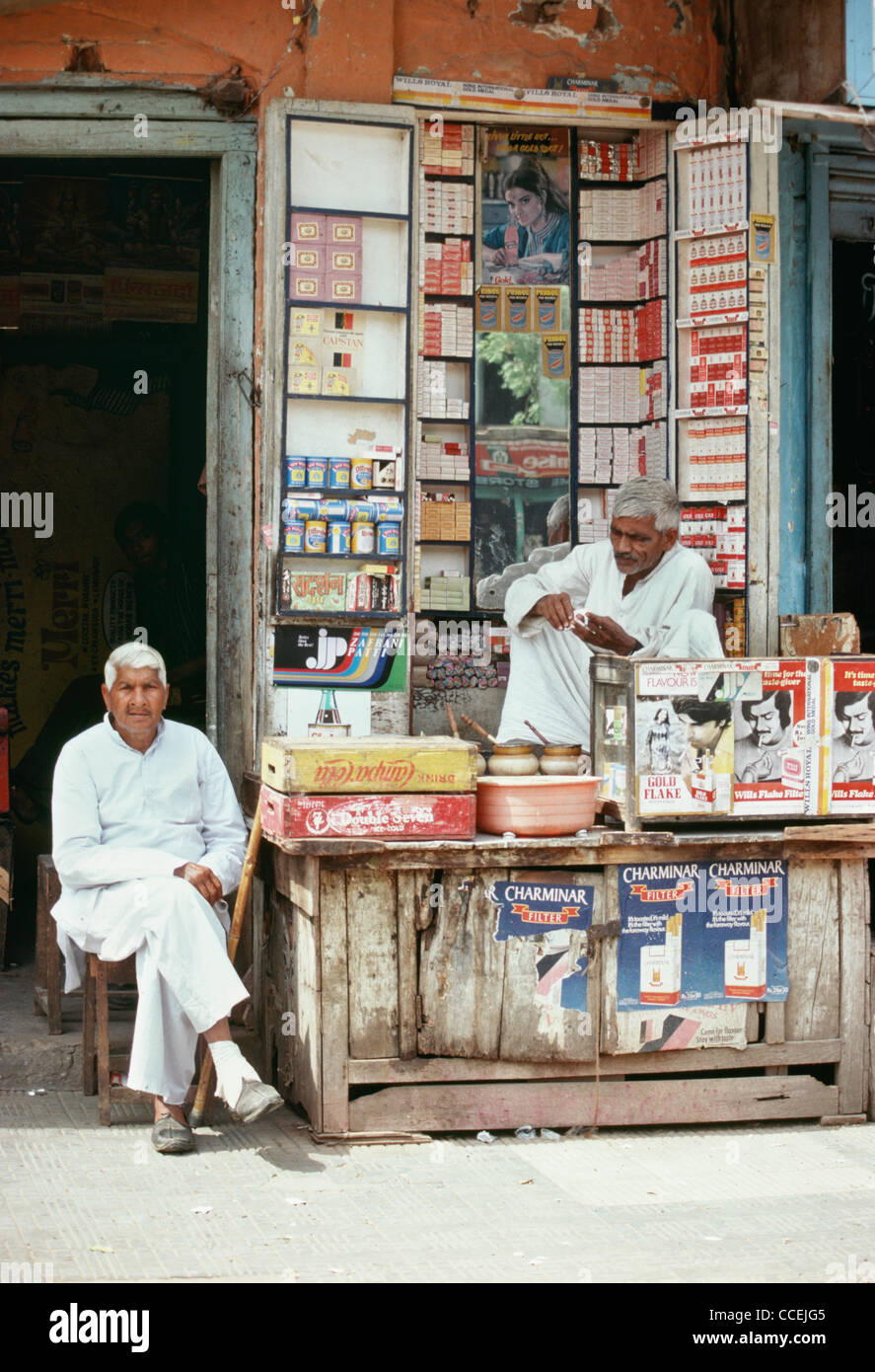 Two Men Staff  Variety Store, Marketplace, New Delhi, 1981 Stock Photo