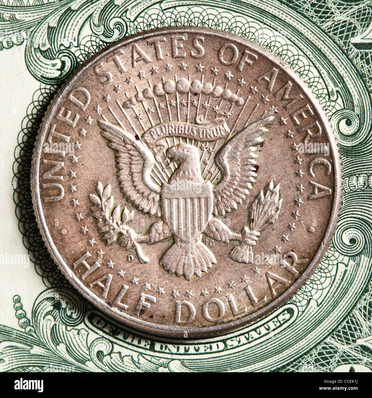 Half dollar coin close up on banknote Stock Photo